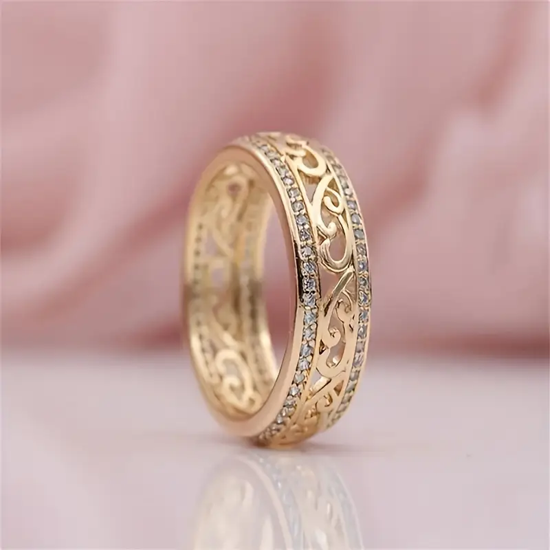 Bague dorée ajourée brillante